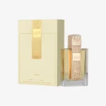 Lattafa Angham perfume bottle styled on marble surface with dried florals